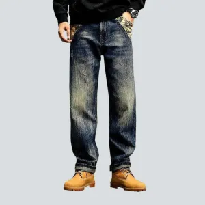 Yellow cast whiskered jeans
 for men